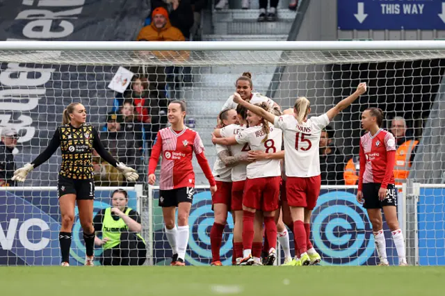 Rachel Williams of Manchester United celebrates with teammates