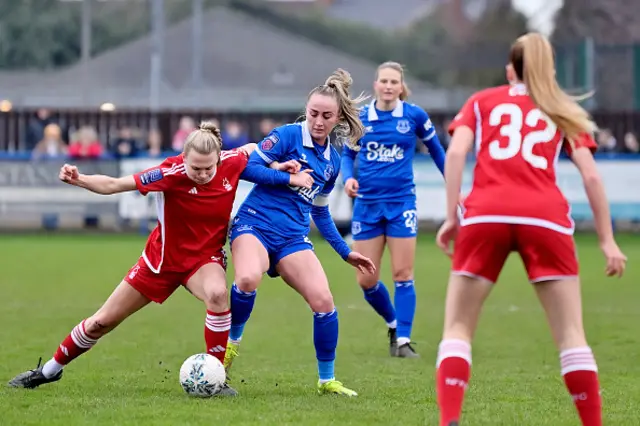 Megan Finnigan competes for the ball