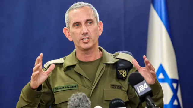 Israeli army spokesman Rear Admiral Daniel Hagari speaks to the press from The Kirya, which houses the Israeli Ministry of Defence, in Tel Aviv on October 18, 2023.