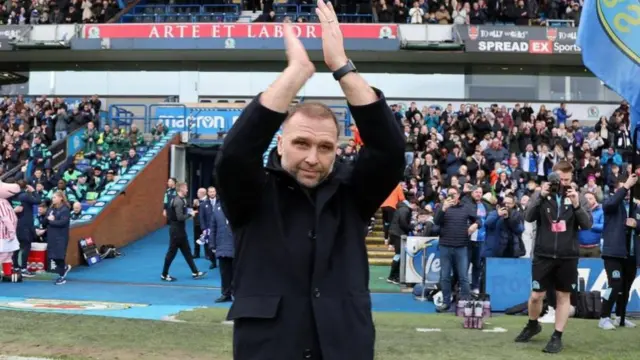 Newly appointed Blackburn boss John Eustace applauds the crowd at Ewood Park