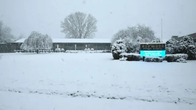 Snow in front of Norwood Public School