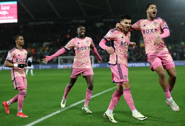 Leeds celebrate a goal at Swansea