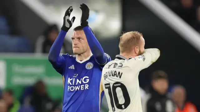 Jamie Vardy applauds the Leicester fans