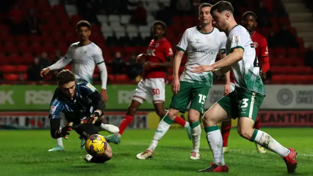 Charlton and Lincoln in action