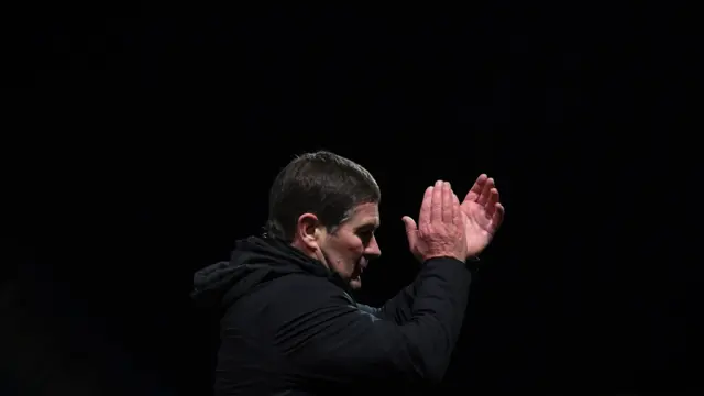 Mansfield Town manager Nigel Clough claps the fans