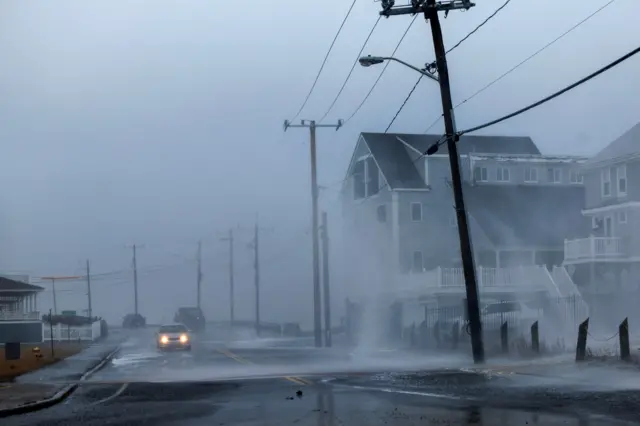 Car, road, house, waves