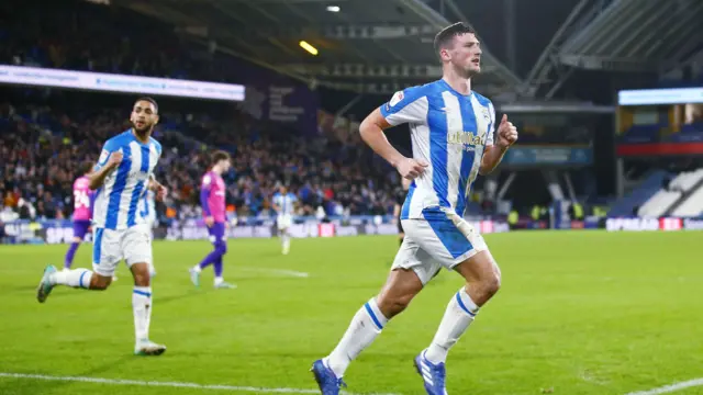 Matty Pearson runs away after scoring for Huddersfield against Sunderland