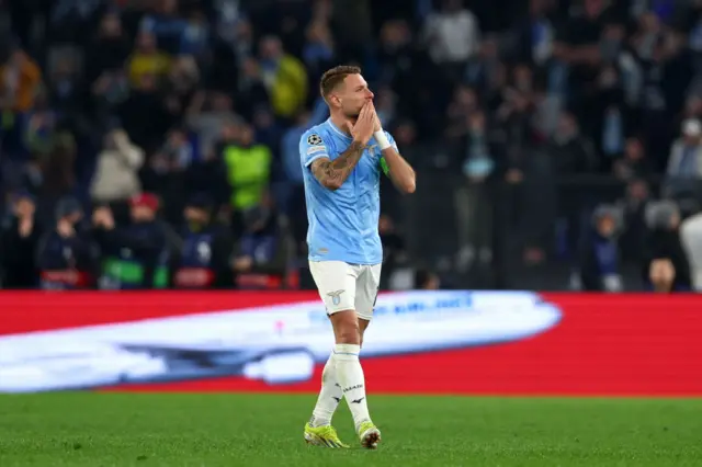 Immobile blows kisses to the fans after his goal.