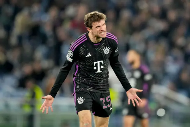 Muller reacts angrily to an incident.