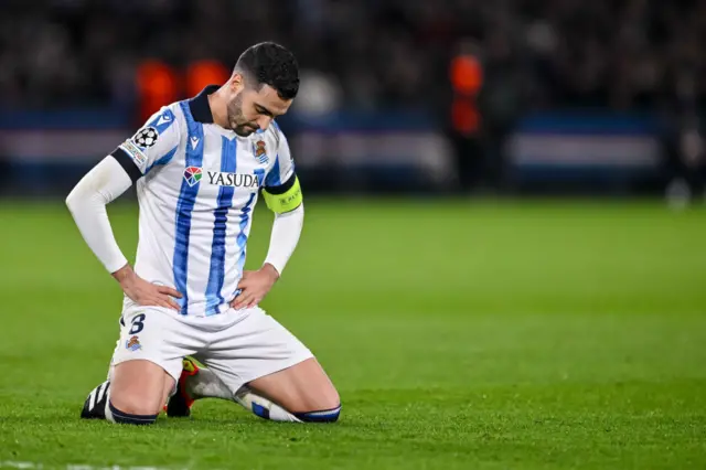 Merino sinks to his knees after a failed pass.