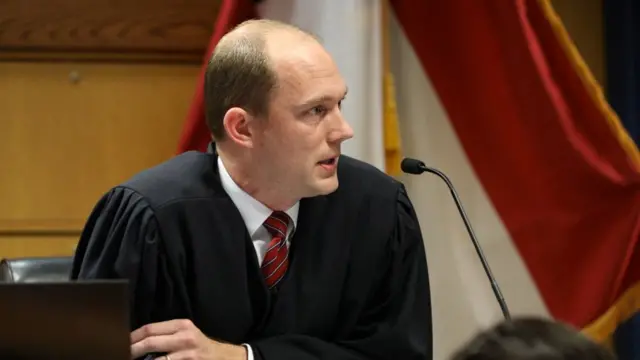 Fulton County Superior Judge Scott McAfee speaks during a hearing in the case of State of Georgia v. Donald John Trump at the Fulton County Courthouse in Atlanta, Georgia, U.S., February 15, 2024.