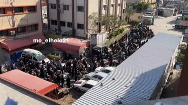 Screengrab posted by Palestinian journalist Mohammed al-Helo showing civilians leaving Nasser hospital in Khan Younis, southern Gaza (14 February 2023)