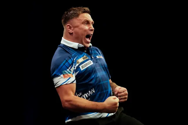 Gerwyn Price celebrates a break of throw against Luke Littler