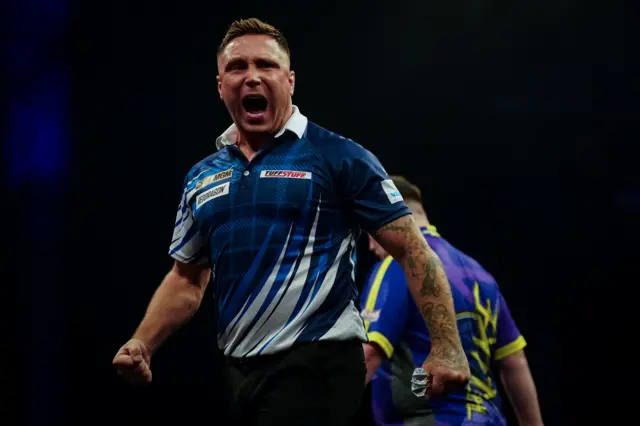 Gerwyn Price celebrates beating Luke Littler in Premier League of Darts in Glasgow