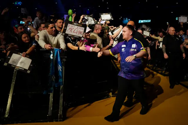 Luke Littler walks on for the Premier League Darts night in Glasgow