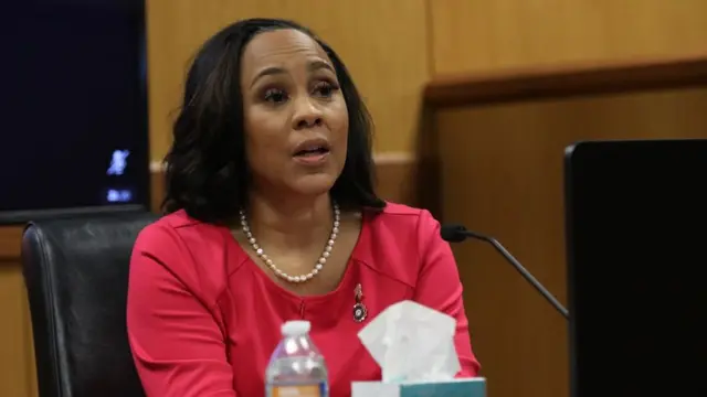 Attorney Fani Willis takes the stand as a witness during a hearing in the case of State of Georgia v. Donald John Trump at the Fulton County Courthouse in Atlanta, Georgia, USA, 15 February 2024.