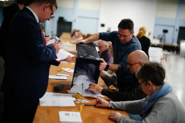 Ballot boxes in Kingswood are emptied as the polls close