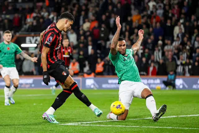 Jamal Lascelles of Newcastle United blocks Dominic Solanke's shot