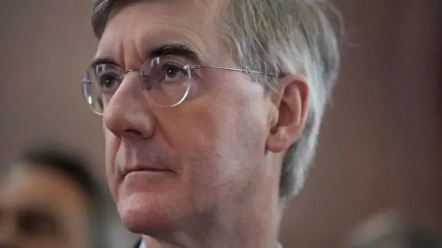 A close-up on the face of Tory MP Jacob Rees-Mogg