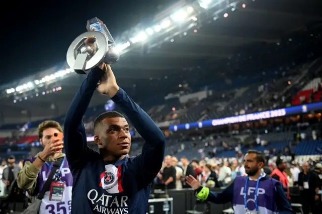 Kylian Mbappe hup his trophy during the 2022-2023 Ligue 1 championship trophy