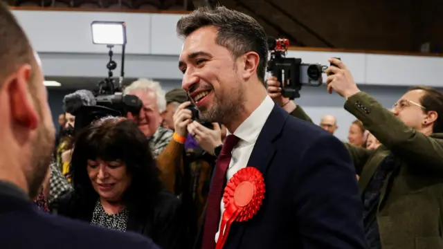 Labour Party candidate Damien Egan reacts after winning the Kingswood Parliamentary by-election at Thornbury Leisure centre in Thornbury, Britain, February 16, 2024