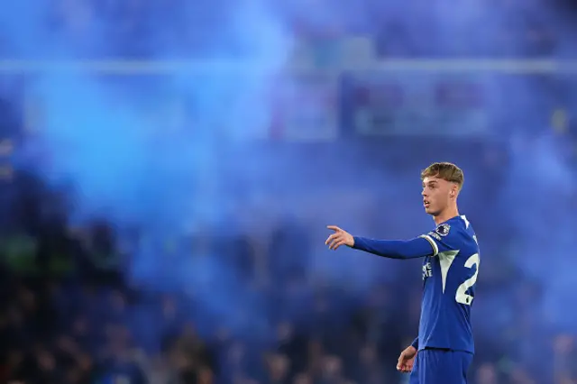 Cole Palmer points while playing for Chelsea
