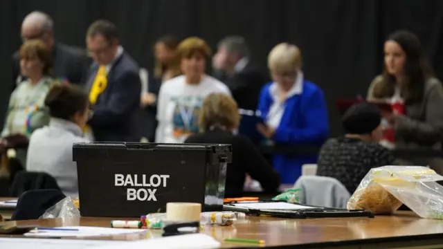 Ballot boxes arrive as polls close and counting begins for the Wellingborough by-election at the Kettering Leisure Village, Northamptonshire.