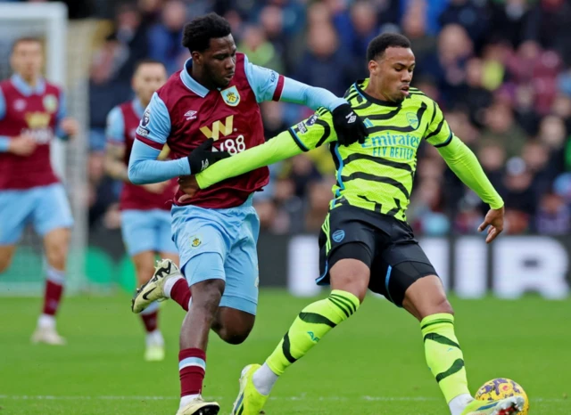 Gabriel in action with Burnley's David Datro Fofana