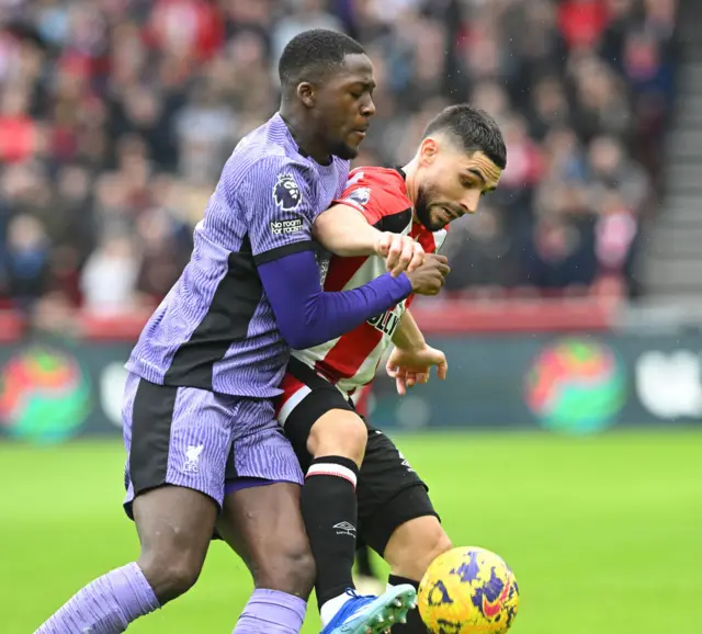 Ibrahima Konate and Neal Maupay