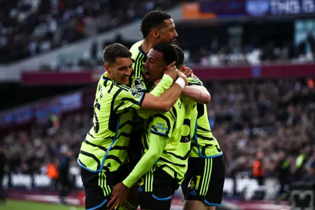 Gabriel celebrates with team-mates after scoring for Arsenal at West Ham