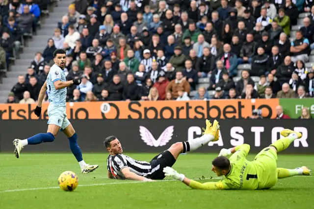 Dominic Solanke of AFC Bournemouth shoots under pressure from Fabian Schaer