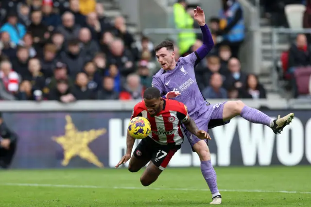 Ivan Toney and Andy Robertson