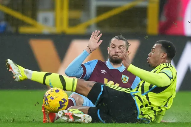 Jay Rodriguez (L) vies with Arsenal's Brazilian defender #06 Gabriel Magalhaes