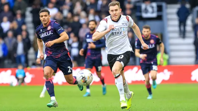 Derby County's Callum Elder runs on to a pass