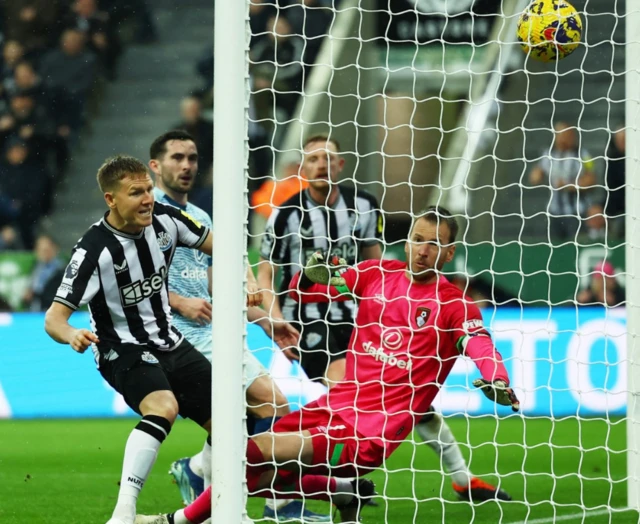 Matt Ritchie pokes the ball in the net