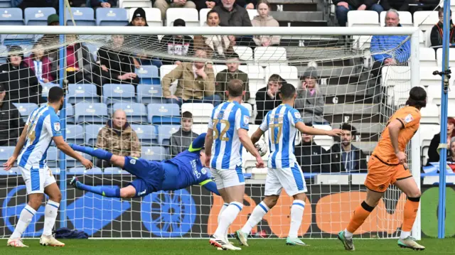 Jacob Greaves scores for Hull at Huddersfield