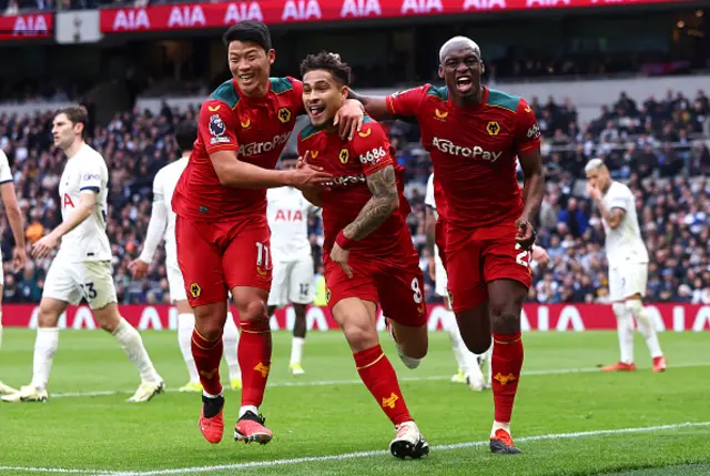 Joao Gomes of Wolverhampton Wanderers celebrates with teammates