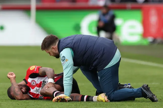 Ivan Toney attended to by physio