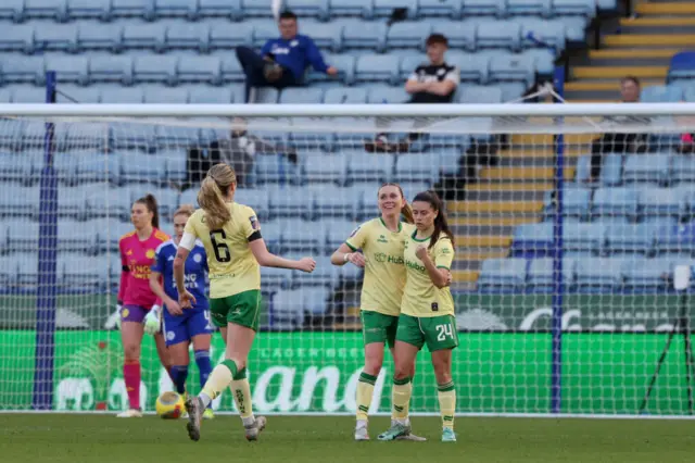 Morgan celebrates with a teammate after opening the scoring for Bristol.