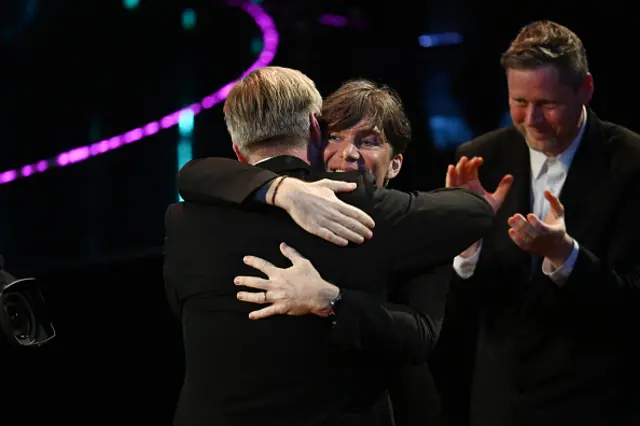 Cillian Murphy hugs man