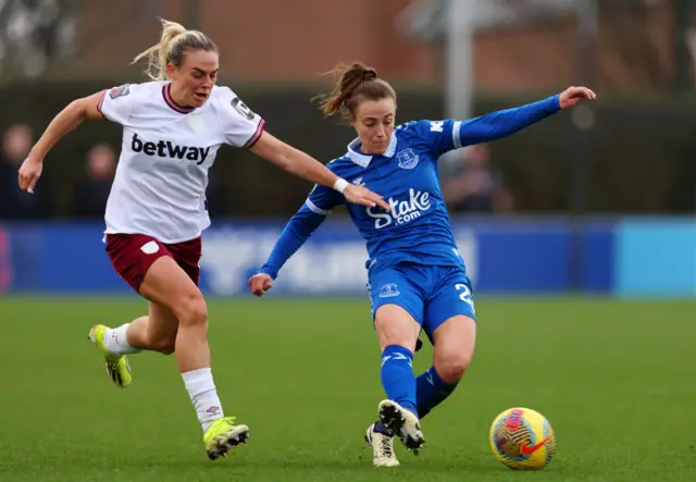 Galli attempts to play the ball upfield under pressure.