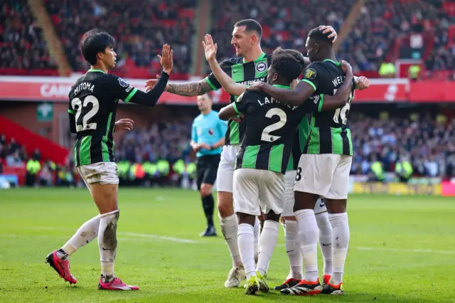 Brighton players celebrate