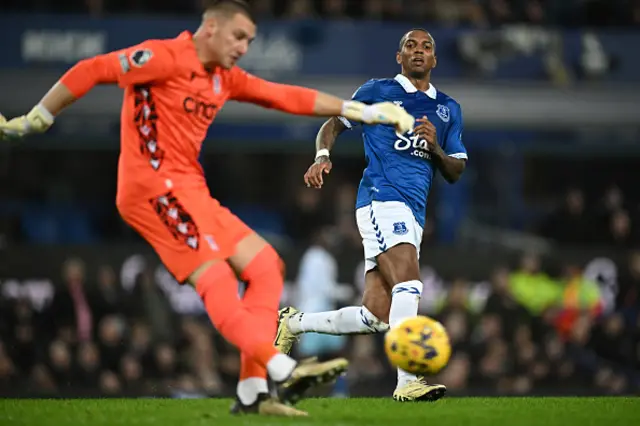 Ashley Young looks on as Sam Johnstone kicks the ball