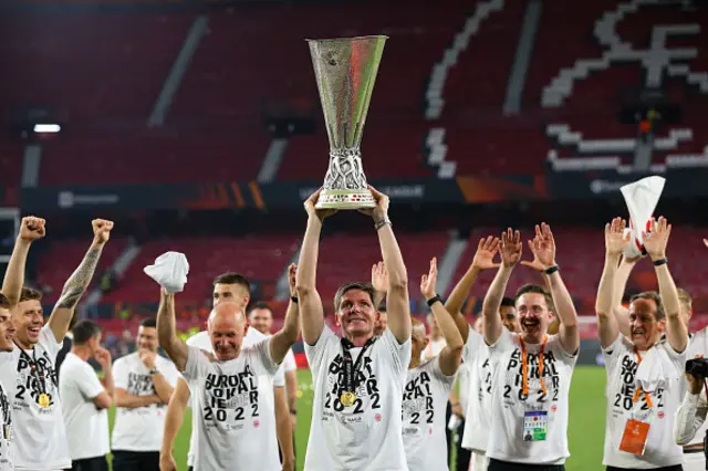 Oliver Glasner celebrates with the trophy after the UEFA Europa League final