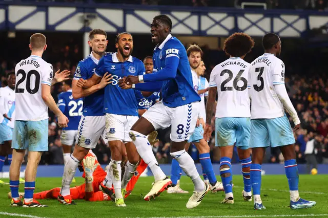 Amadou Onana of Everton celebrates scoring his side's first goal during the Premier League match between Everton FC and Crystal Palace at Goodison Park