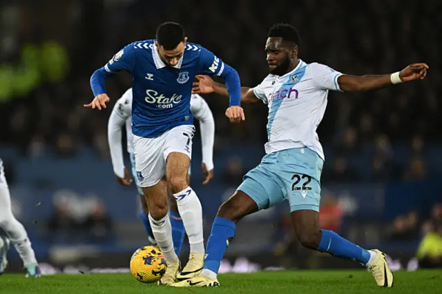 Dwight McNeil (L) vies with Crystal Palace's French striker Odsonne Edouard