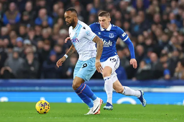 Jordan Ayew of Crystal Palace and Vitaliy Mykolenko