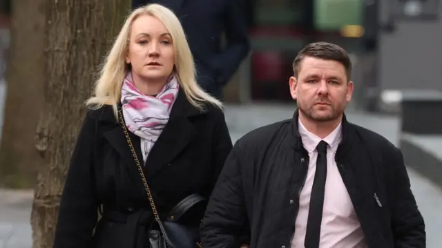 Peter Spooner and a woman outside court
