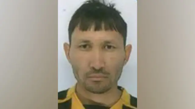 Passport style photo of suspect Abdul Shokoor Ezedi