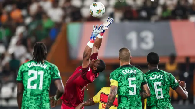 Stanley Nwabali claims the ball